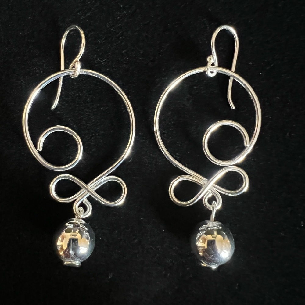 Flirty, Fun Silver Swirl Earrings